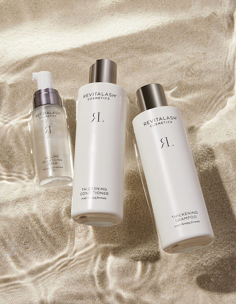 Volumizing Hair Collection on the water in sand