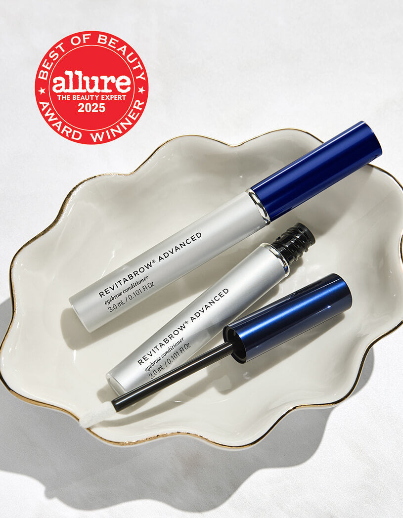 RevitaBrow Advanced on a decorative plate with 2025 Allure Best of Beauty Award badge.